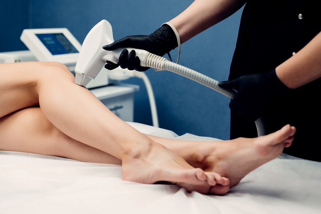 Close up of woman legs during procedure of laser hair removal