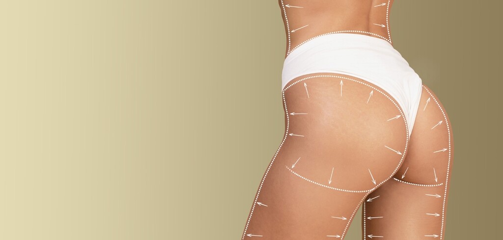 woman wearing white bikini showing her buttocks