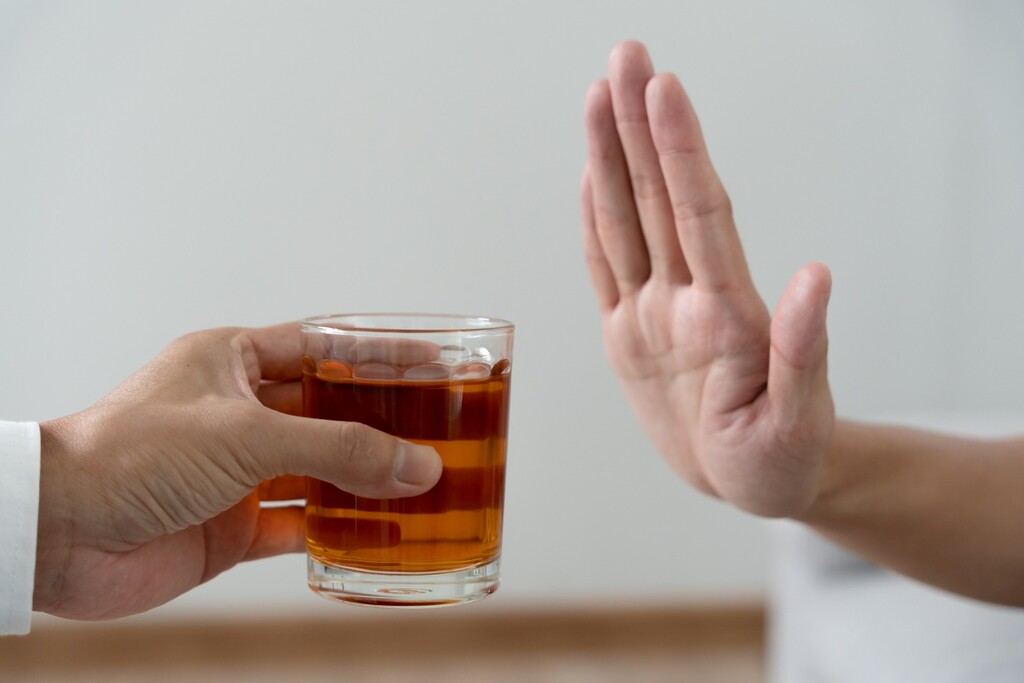 person refusing alcoholic drink