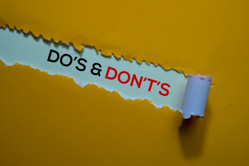 Do's and Don't's Text written in torn paper